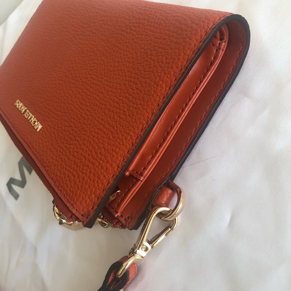 MICHAEL MICHAEL KORS
Adele Leather Smartphone Wallet Orange Never Carried - Picture 6 of 11